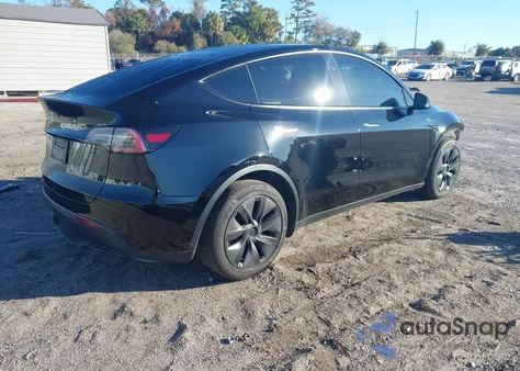 2025 Tesla Model Y Long Range Single Motor Rear-Wheel Drive z USA, uszkodzony, nr VIN 7SAYGDED9SA355819